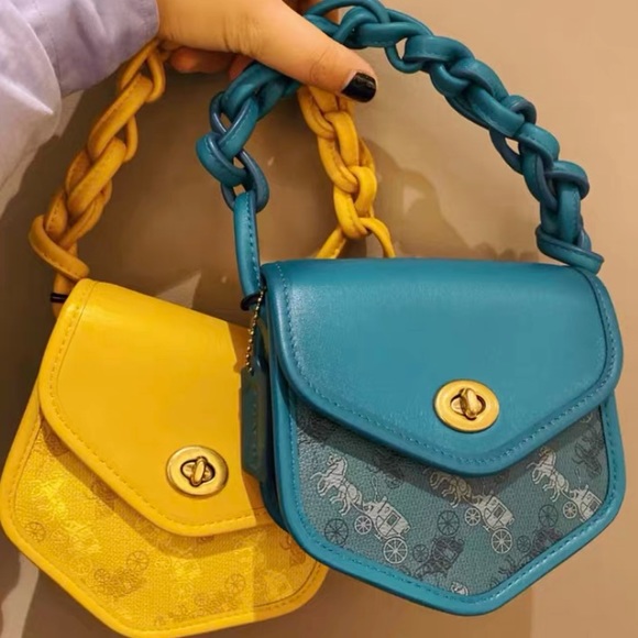 Coach Handbags - Discontinued‼️Coach Turnlock Flap Pouch 15